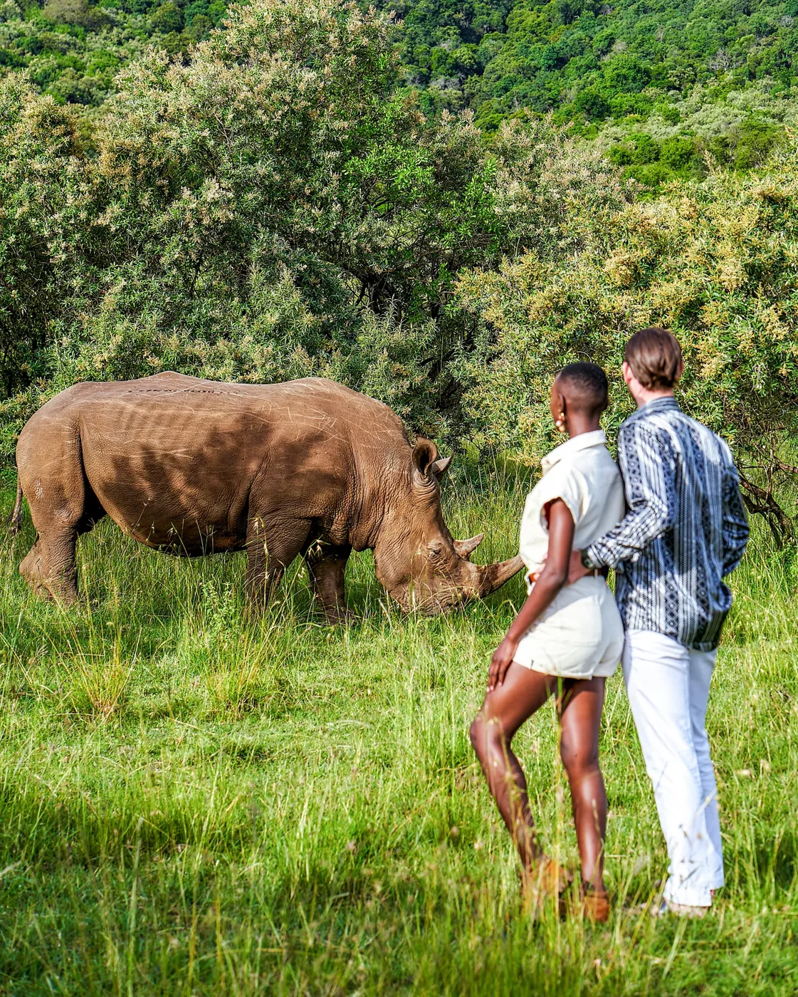 A couple sharing a wildlife encounter in Kenya